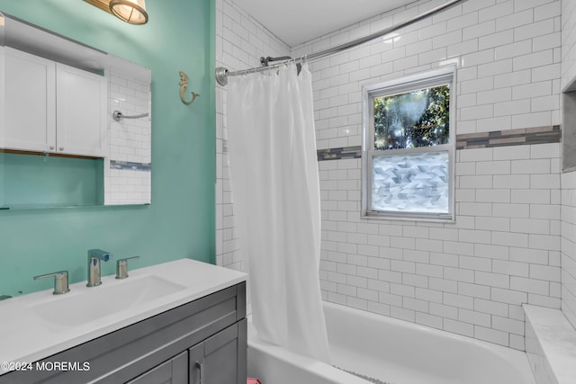 bathroom featuring shower / bath combination with curtain and vanity