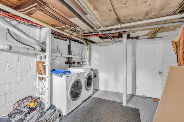 laundry room featuring separate washer and dryer