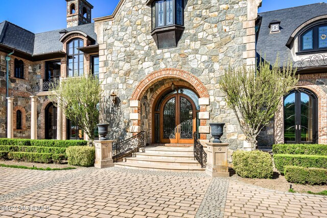 doorway to property with french doors