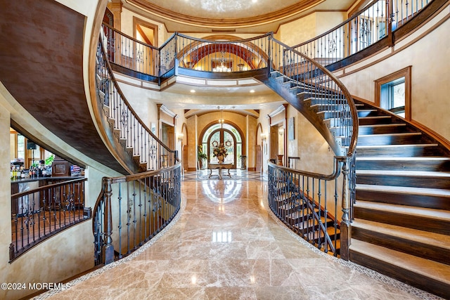 86 Montrose Rd, Colts Neck, NJ 07722 - foyer with marble finish floor, stairs, arched walkways, and a healthy amount of sunlight