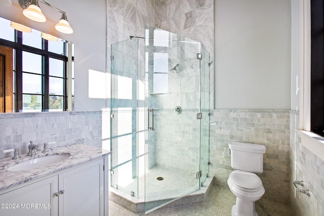 86 Montrose Rd, Colts Neck, NJ 07722 - bathroom with a stall shower, toilet, vanity, tile patterned flooring, and tile walls
