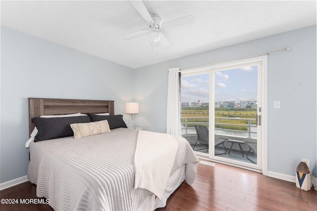 bedroom featuring access to outside, ceiling fan, baseboards, and wood finished floors