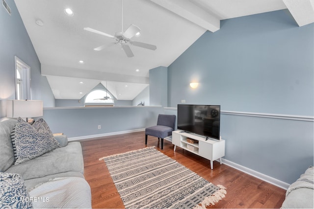 living room with vaulted ceiling with beams, ceiling fan, and dark hardwood / wood-style floors