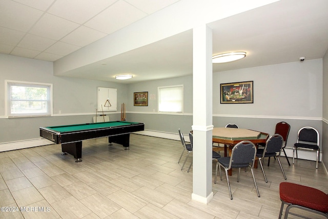 game room with pool table, a paneled ceiling, a wealth of natural light, and ornate columns