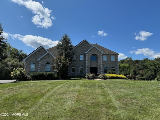 view of front of home with a front yard