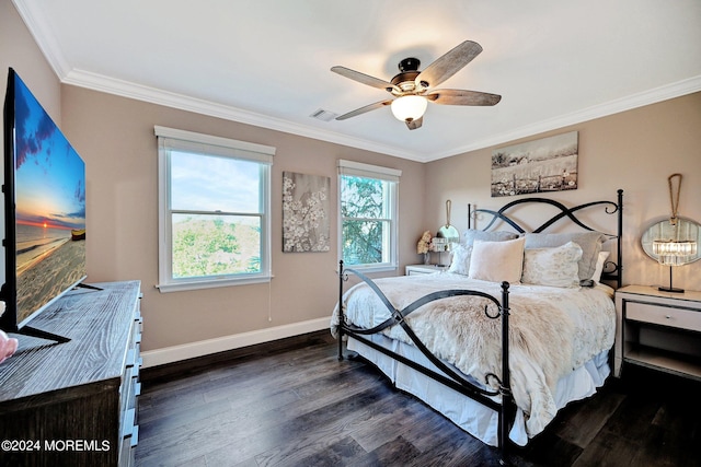 bedroom featuring dark wood-style floors, baseboards, visible vents, and crown molding