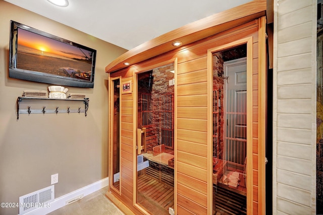 view of sauna with recessed lighting, tile patterned flooring, and baseboards