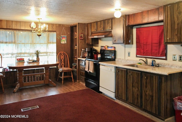 kitchen with sink, an inviting chandelier, dark hardwood / wood-style flooring, white dishwasher, and black electric range oven