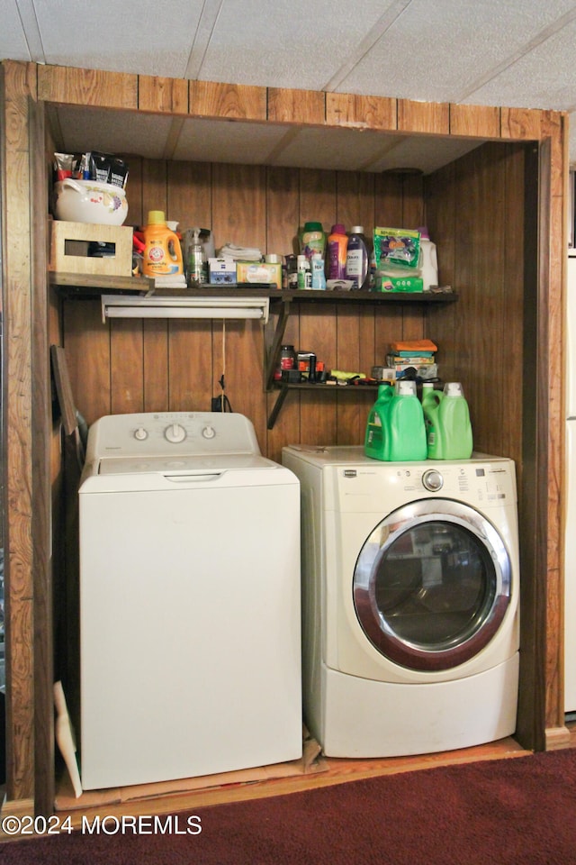 laundry area with separate washer and dryer