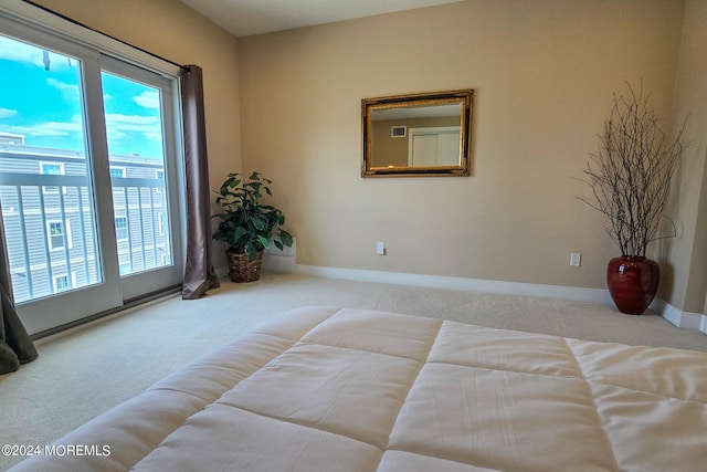 carpeted bedroom with baseboards