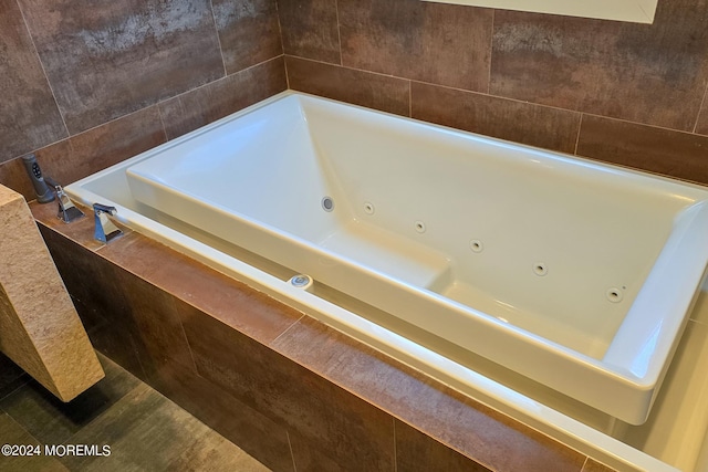 bathroom with a jetted tub