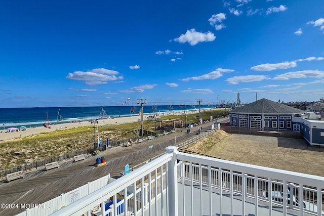 property view of water featuring a beach view