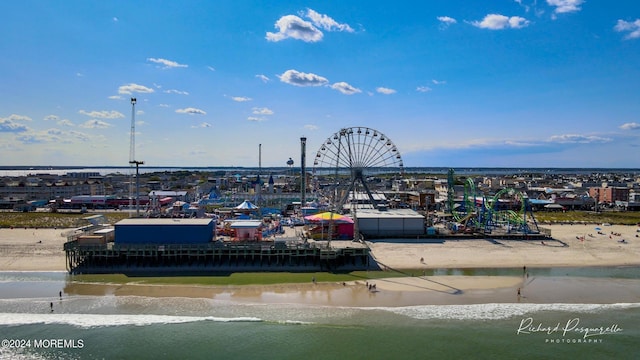 aerial view with a beach view and a water view