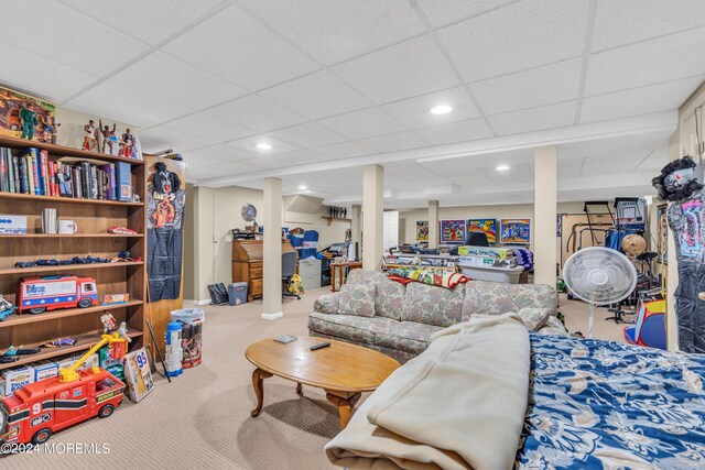 carpeted living room featuring a paneled ceiling and recessed lighting