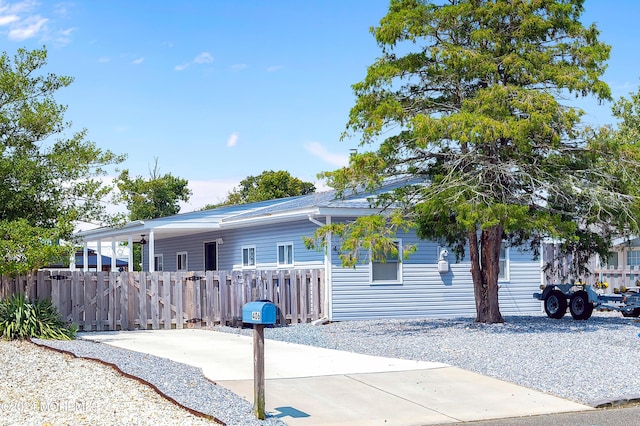 view of front of home with fence