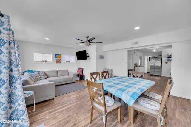 dining area featuring recessed lighting, wood finished floors, visible vents, and a ceiling fan