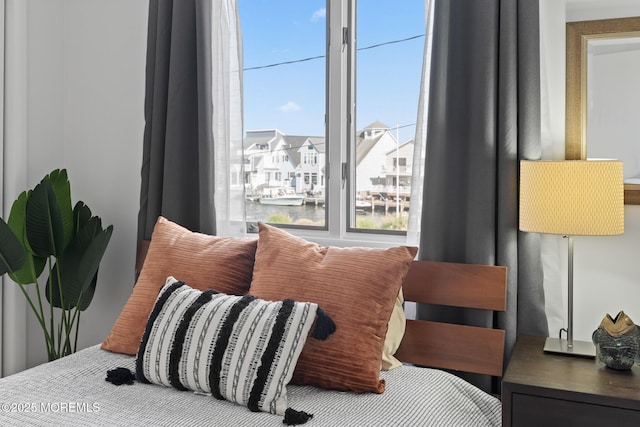 149 Valencia Dr, Brick, NJ 08723 - bedroom with multiple windows and a residential view