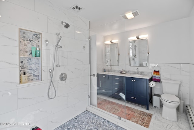 149 Valencia Dr, Brick, NJ 08723 - bathroom with double vanity, tile walls, tiled shower, and a baseboard radiator