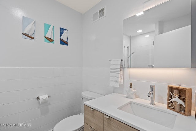 149 Valencia Dr, Brick, NJ 08723 - full bathroom with vanity, tile walls, tiled shower, and wainscoting