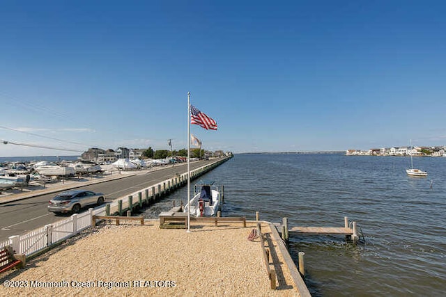 view of dock featuring a water view