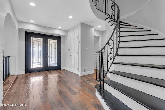 entryway featuring french doors and dark hardwood / wood-style flooring