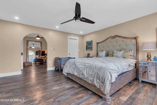 bedroom featuring ceiling fan and dark hardwood / wood-style flooring