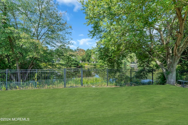 view of yard with a water view