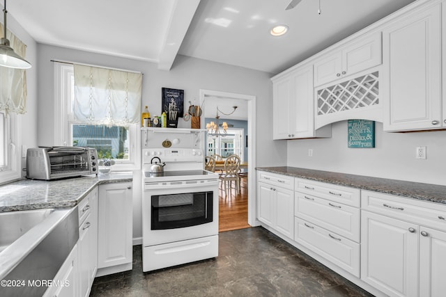 kitchen with white cabinets, ceiling fan with notable chandelier, beamed ceiling, decorative light fixtures, and white range with electric cooktop