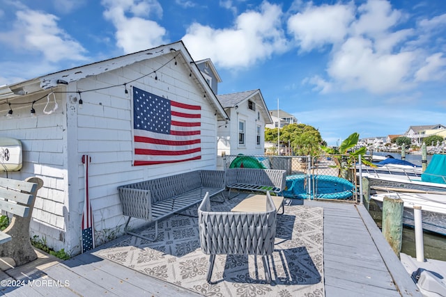 exterior space featuring an outdoor hangout area