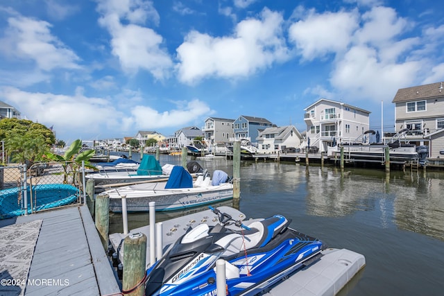 view of dock with a water view