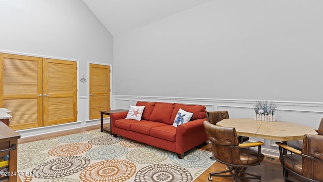 office area featuring light hardwood / wood-style flooring and high vaulted ceiling