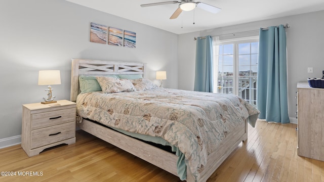 bedroom with light hardwood / wood-style flooring and ceiling fan