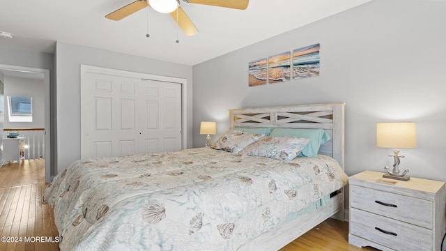 bedroom featuring a closet, ceiling fan, and light hardwood / wood-style floors