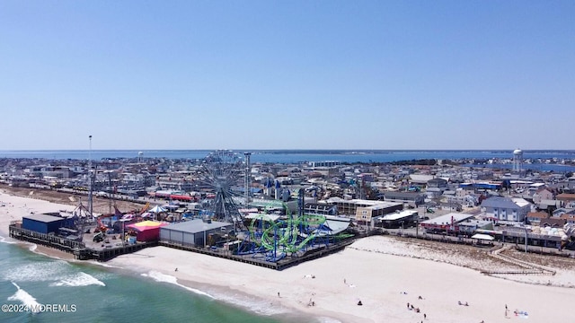 drone / aerial view with a view of the beach and a water view