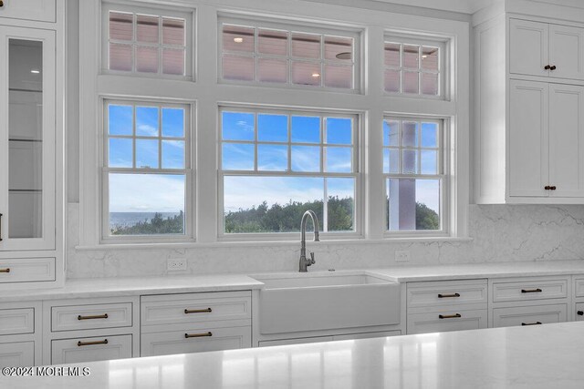 kitchen with sink and white cabinetry