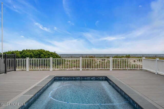 view of pool featuring a deck