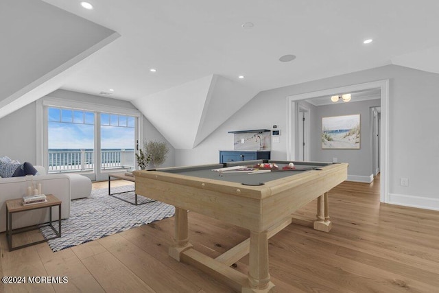 playroom with pool table, lofted ceiling, and light wood-type flooring