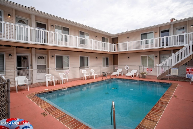 community pool featuring a patio