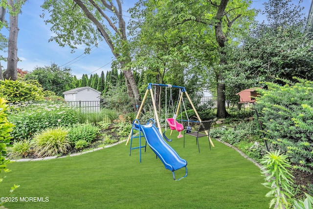 view of play area featuring a lawn