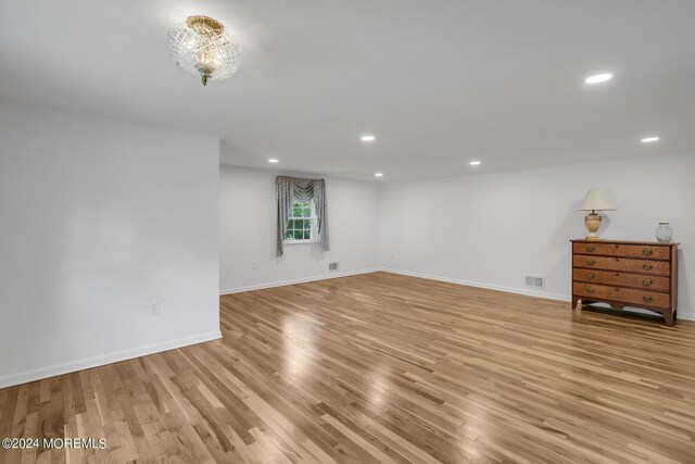 unfurnished room featuring light wood-type flooring