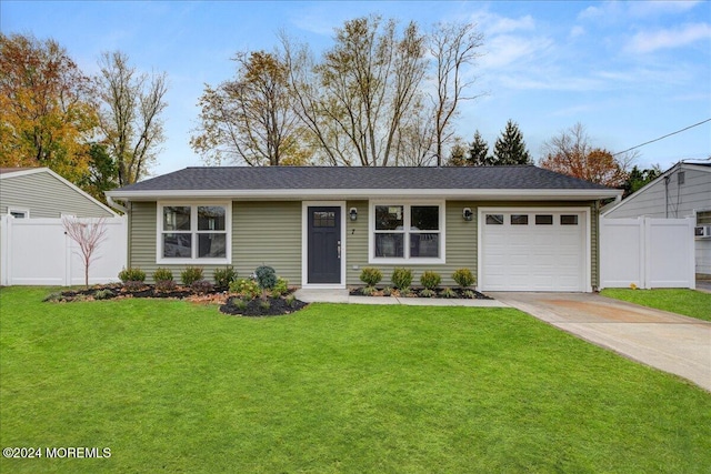 ranch-style house with a front yard and a garage