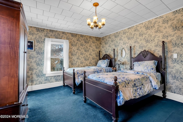 bedroom with a notable chandelier, dark carpet, baseboards, and wallpapered walls