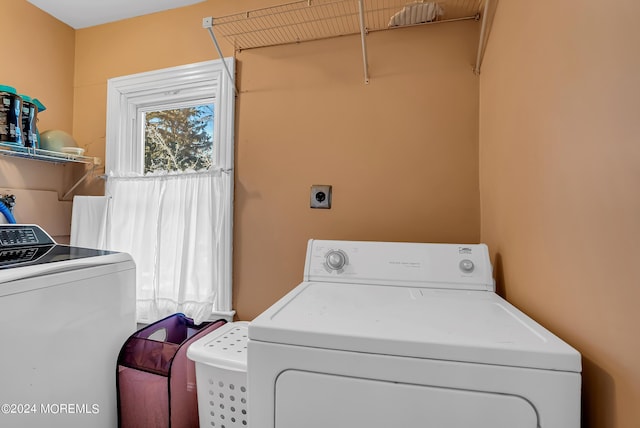 laundry room featuring laundry area and washer and clothes dryer