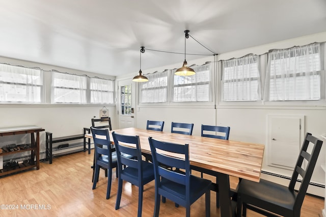 dining room with light wood-style floors