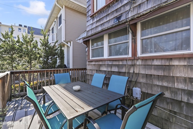 deck featuring outdoor dining space