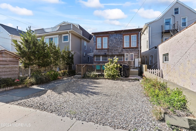 view of front of house with a deck