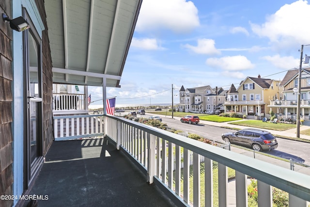 balcony with a porch and a residential view