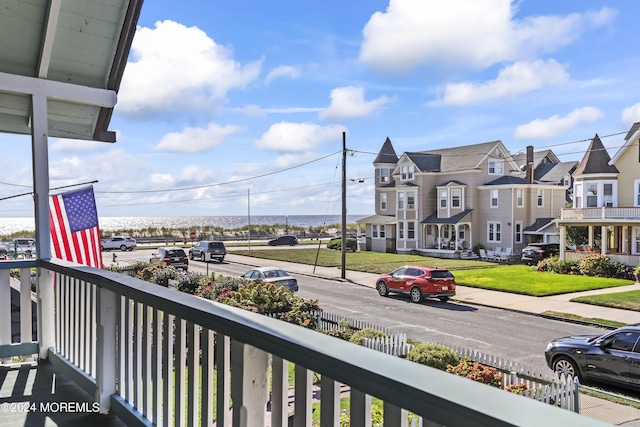 balcony featuring a residential view