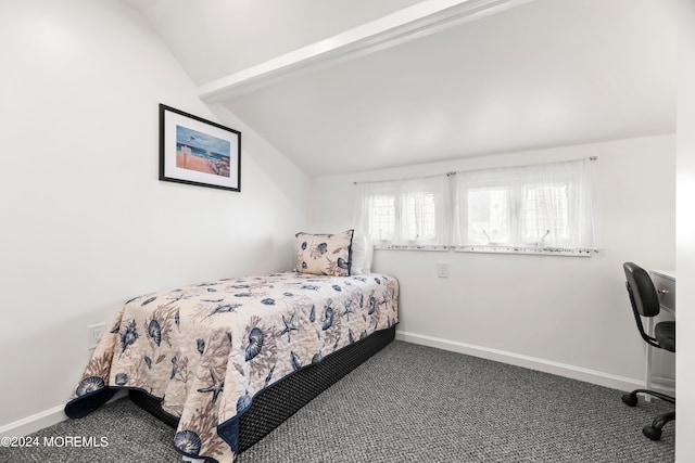 carpeted bedroom featuring lofted ceiling