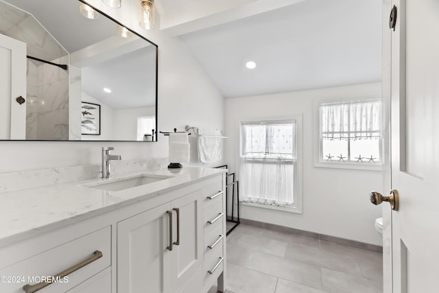 full bath with baseboards, a shower, toilet, vaulted ceiling, and vanity